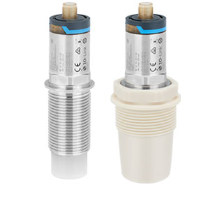 Capacitance point level switch for powdered and fine-grained solids
